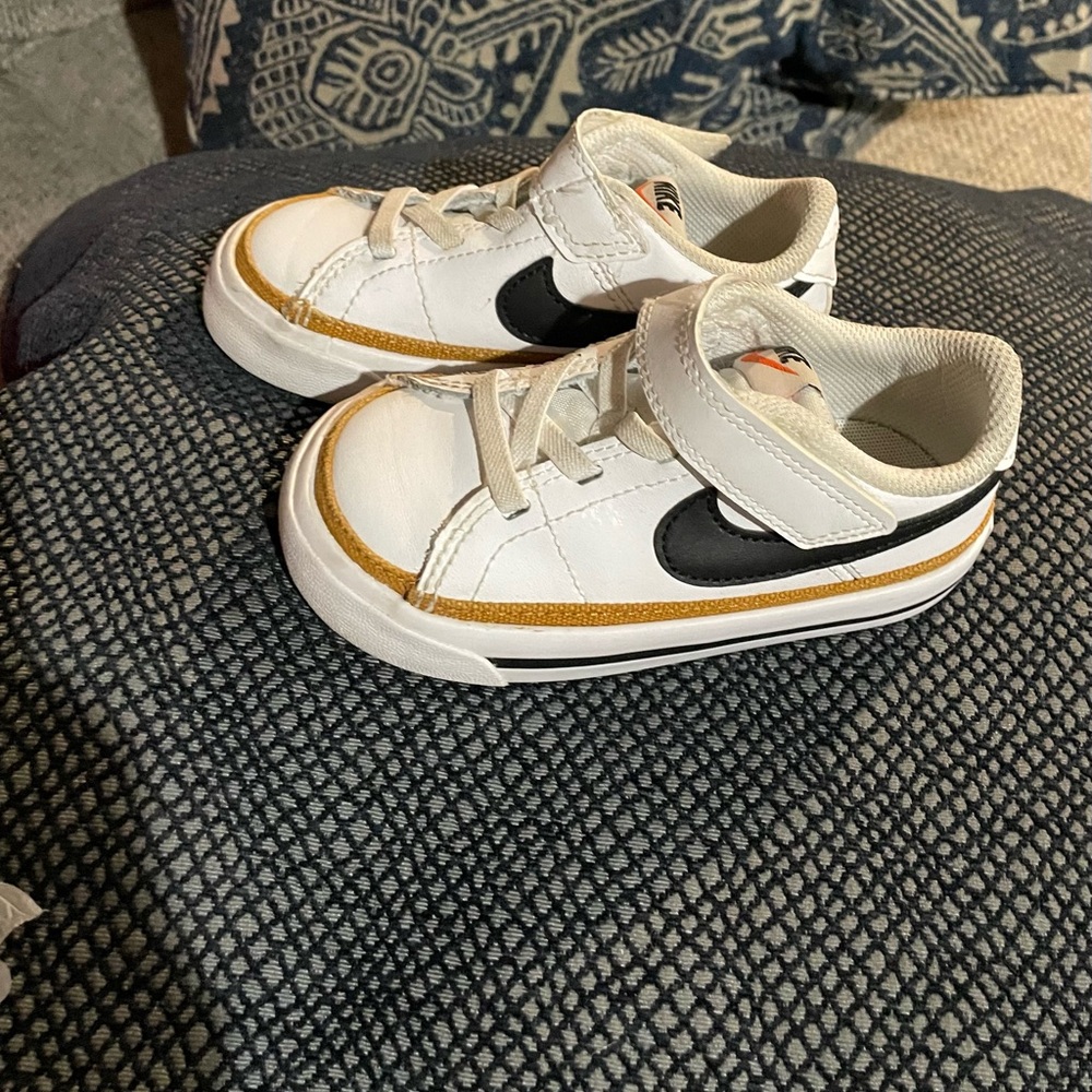 Nike Kids White, Black, and Gold Sneakers